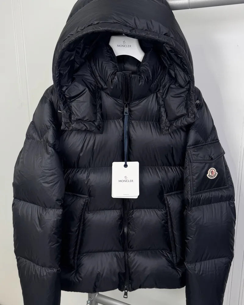 Black Moncler down jacket with tags