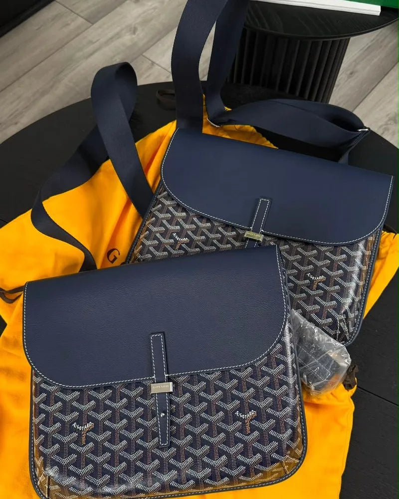 Two navy Goyard messenger bags with dust bag and shopping bag
